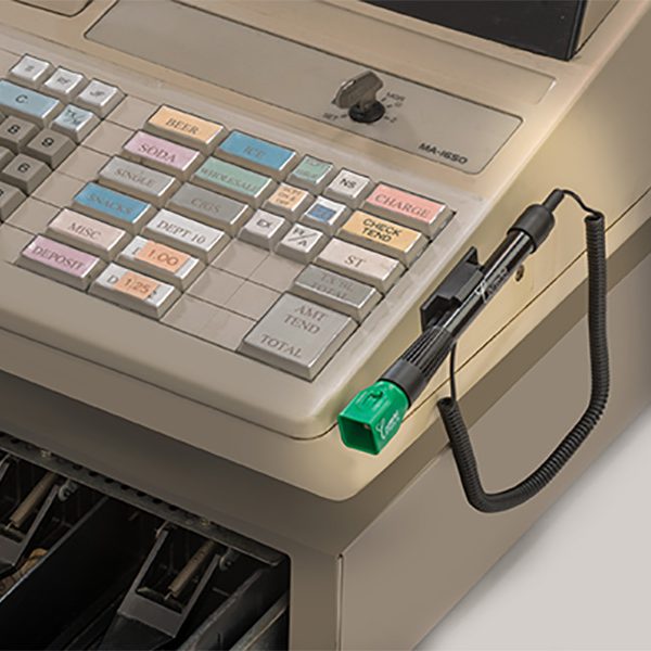 Counterfeit Dual Detector on side of cash register glam photo